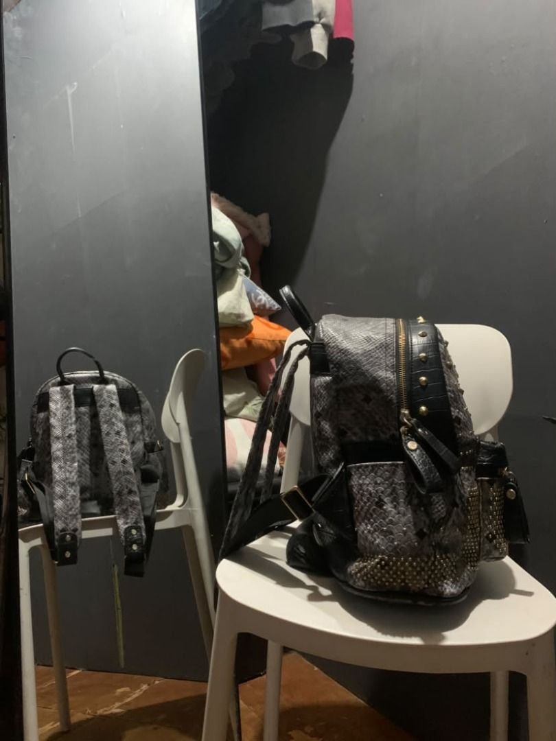 MCM BACKPACK (Category: Backpacks) located in Caloocan City. Submitted by hellnelly21 (Listing ID 1469689121, Image 3). Description: (GRAY SNAKESKIN MCM BACKPACK) SIZE:MEDIUM • LEATHER • GOOD CONDITION • NO ISSUE • HEAVYWEIGHT • COLOR RATE: 10/10 • WITH TAGS • CONDITION RATE: 10/10 • BRAND NEW CONDITION • MULTI STUDS .