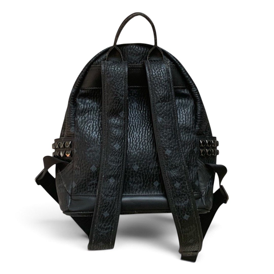 MCM, Visetos Stark Side Studded Backpack in Black (Category: Luxury Bags & Wallets) located in Manila. Submitted by s0leilrouge (Listing ID 1469615826, Image 2). Description: Size M 12x13 Visible signs of age and use ( straps and logo inside ) Searchable code 1250 + SF.