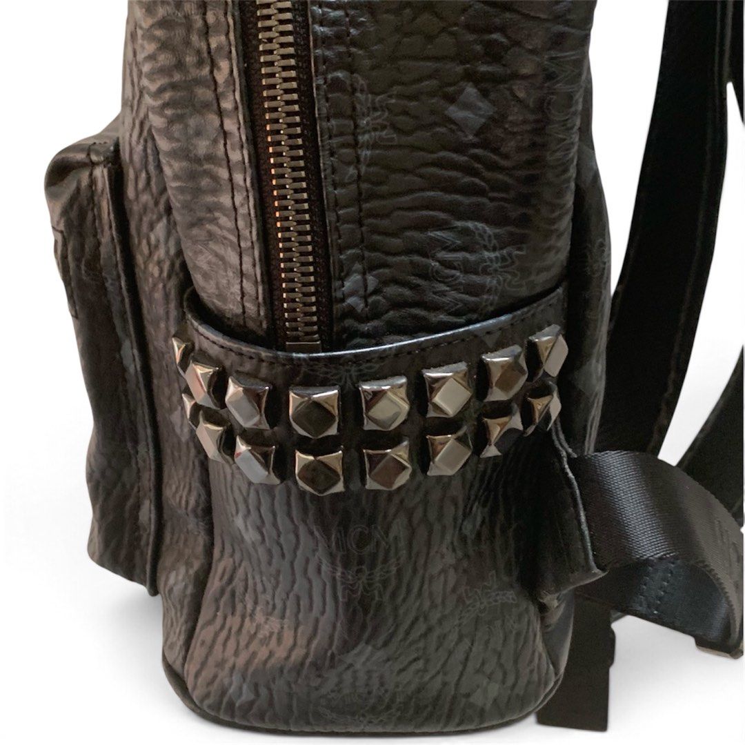 MCM, Visetos Stark Side Studded Backpack in Black (Category: Luxury Bags & Wallets) located in Manila. Submitted by s0leilrouge (Listing ID 1469615826, Image 3). Description: Size M 12x13 Visible signs of age and use ( straps and logo inside ) Searchable code 1250 + SF.