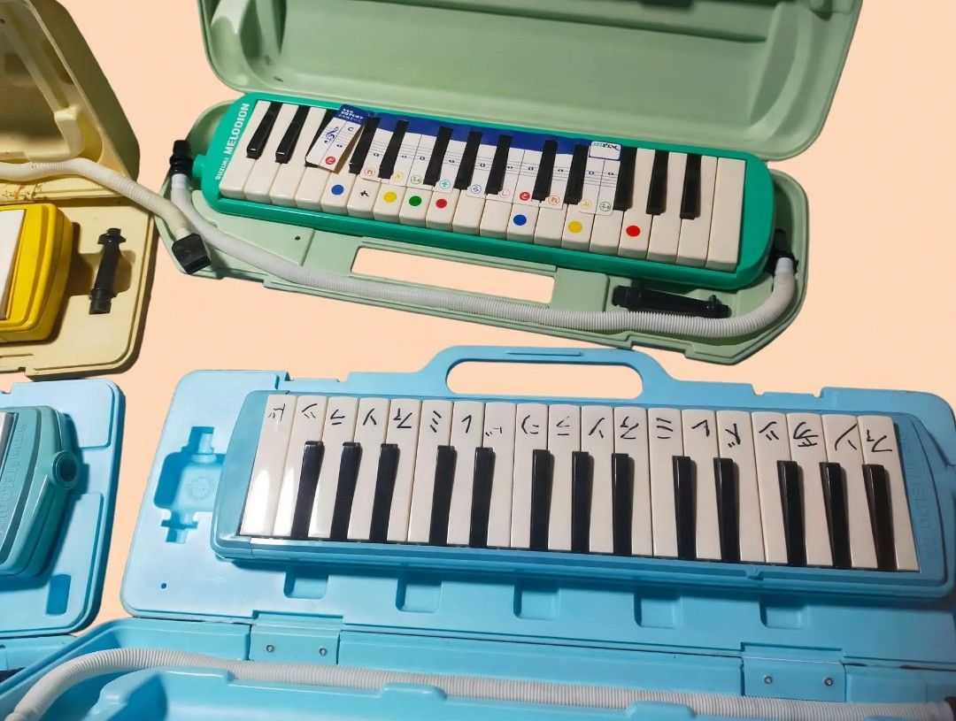 MELODICA / MELODION BUNDLE - 4 PCS* (Category: Musical Instruments) located in Pasay City. Submitted by 22aileen (Listing ID 1469705977, Image 2). Description: MELODICA / MELODION BUNDLE - 4 PCS* Suzuki Melodion Japan made ✅ Inclusion per pc: - Case + hose + mouthpiece - 32 keys, working ✅ Colors: - Yellow - Green (with color guide sticker) - 2x Light Blue ✅ Condition working.