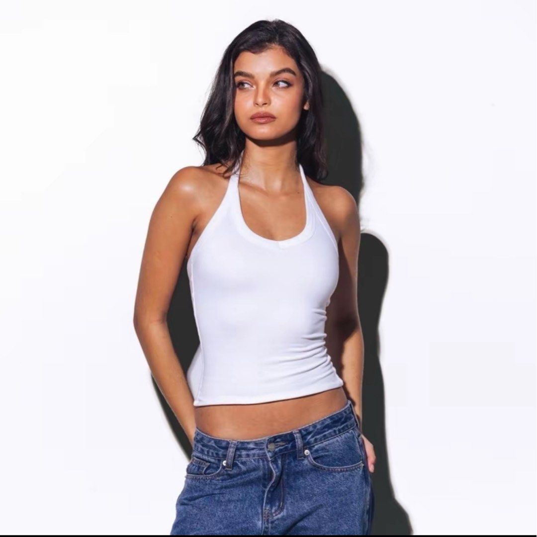 Mera adalina white halter backless basic top (Category: Sleeveless) located in Taytay. Submitted by bye_bye_stuff (Listing ID 1469632079, Image 1). Description: Only worn once Size: Small See exact measurement in photos Buttery body hugging fabric .