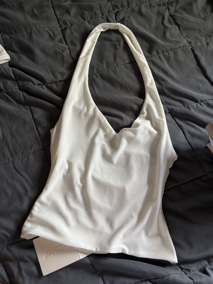 MERA premium white halter top w/ tag (Category: Sleeveless) located in Bauang. Submitted by backburnerbyniki (Listing ID 1469607353, Image 1). Description: .