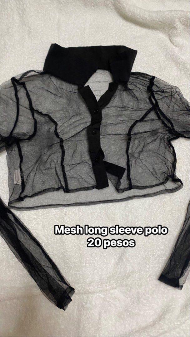 Mesh long sleeve polo black crop top (Category: Longsleeves) located in Manila. Submitted by remotorose29730 (Listing ID 1469642592, Image 1). Description: - Color: Black - Material: Sheer mesh fabric - Style: Long sleeve polo top with collar and front button closure - Details: Trendy exposed seams and cropped length - Fit: Great layering piece for stylish outfits - Condition: Excellent / Brand New - Mode of Payment: GCash, Maya, or Bank Transfer