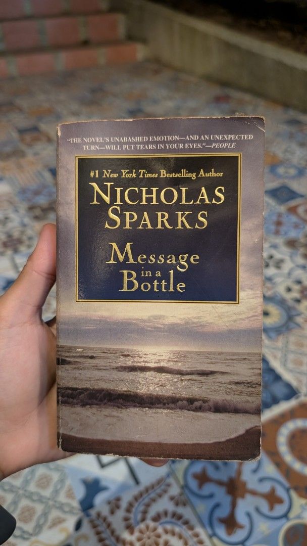 Message in a Bottle by Nicholas Sparks (Category: Storybooks) located in Manila. Submitted by alypacis06 (Listing ID 1469659706, Image 1). Description: - Title: Message in a Bottle by Nicholas Sparks - Format: Paperback edition - Condition: Well-loved with yellowed pages and creased cover, but fully readable - Genre: Contemporary romance / emotional fiction - Perfect as a casual, heart-wrenching beach read.
