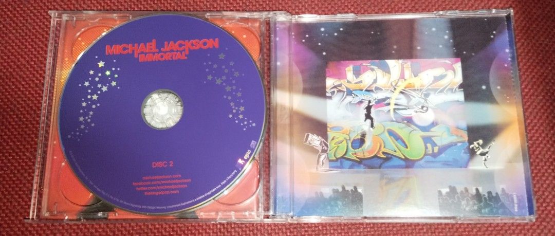 Michael Jackson Immortal 2-CD Deluxe Edition (Category: CDs & DVDs) located in Caloocan City. Submitted by arashipao28 (Listing ID 1469758669, Image 3). Description: Michael Jackson Immortal 2-CD Deluxe Edition Price- 600 Comes with 2-CD and a blue cardboard sleeve. Discs are in near mint condition , still plays fine with no skips. Can do shipping or Lalamove ng buyer, payment via Gcash.
