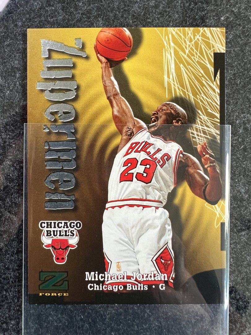 Michael Jordan TCG_FEATURES_OTHERS (Category: Raw Singles) located in Mandaluyong City. Submitted by maropa (Listing ID 1469589156, Image 1). Description: - Item: 1997-98 Michael Jordan Z-Force Trading Card - Card Number: #190 (Z-Supermen Subset) - Design: Stunning gold background with embossed silver lettering and Bulls #23 layout - Reverse: Includes player quote and 1998 SkyBox copyright - Condition/Protection: Well-preserved and kept inside a 