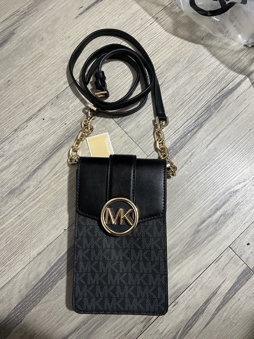MICHAEL KORS CARMEN PHONE SLING BAG (Category: Cross-body Bags) located in Baguio. Submitted by kyrawang22 (Listing ID 1469574909, Image 1). Description: .