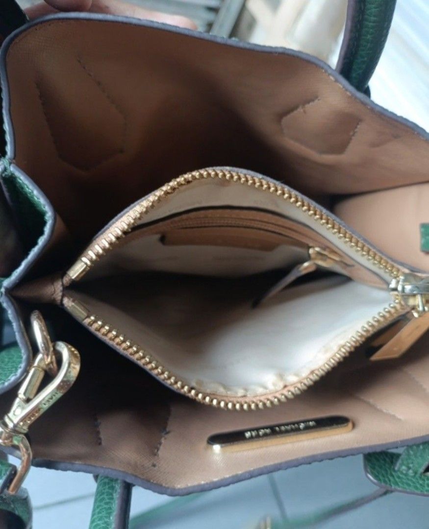 MICHAEL KORS MERCER CROSSBODY BAG (Category: Tote Bags) located in Quezon City. Submitted by collectandselect (Listing ID 1469712679, Image 3). Description: MICHAEL KORS MERCER CROSSBODY BAG DARK GREEN PEBBLE LEATHER - Material: Premium dark green pebbled leather - Hardware: Elegant gold-tone accents - Interior: Tan lining with a convenient central zipped compartment - Straps: Double top handles and an adjustable, detachable shoulder strap - Cond