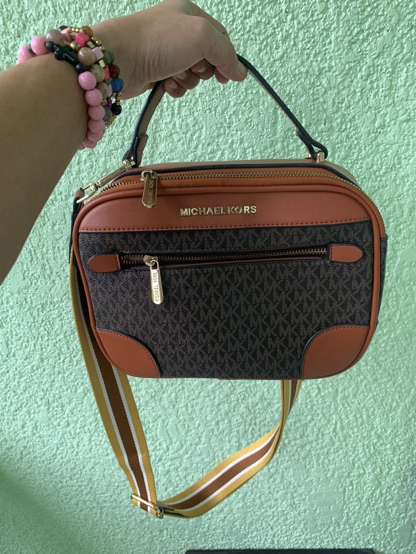 Michael kors sling bag (Category: Luxury Bags & Wallets) located in Malolos. Submitted by celyesha (Listing ID 1469670789, Image 1). Description: Almost new MK 2 way bag For faster transaction, please txt me at 09266770475 Rfs decluttering.