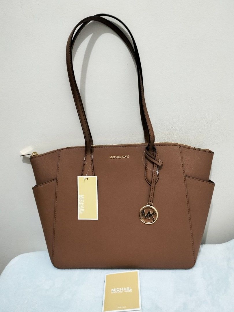 Michael Kors Tote Bag (Category: Tote Bags) located in Quezon City. Submitted by rhitzycorner (Listing ID 1469593104, Image 3). Description: Brandnew and 💯 authentic Purchased fro US with original tag On hand and ready to ship Also open for layaway/installment with no additional interest up to 2 months.