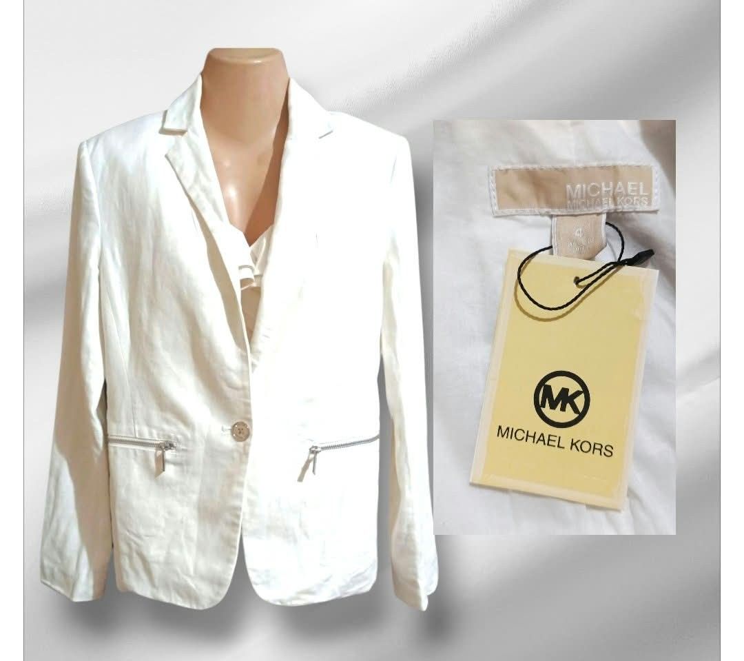 Michael Kors White Linen Blazer Size 4 (Category: Coats, Jackets and Outerwear) located in Paranaque City. Submitted by calm_youngstore7 (Listing ID 1469613883, Image 3). Description: - Brand: Michael Kors - Size: 4 (Tailored fit) - Color: Crisp White - Material: Breathable linen fabric - Condition: Brand new with store tags attached - Details: Single-button closure, structured lapels, zipped front pockets, and clean back vent.