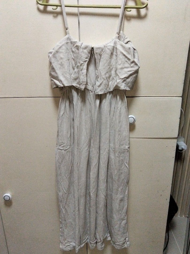 Midi Dress (Category: Dresses) located in Cavite. Submitted by dspace.ph (Listing ID 1469597660, Image 2). Description: only worn twice or thrice during my college graduation and vacation. no need to wear a separate bra since it has a built-in chest lining for coverage. it also has side pockets and adjustable spaghetti straps color: cream or beige.