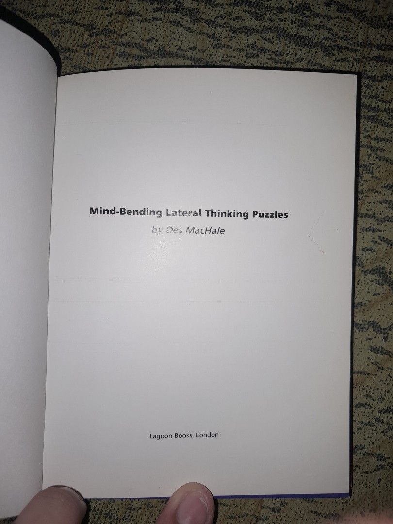 Mind-Bending Lateral Thinking Puzzles by Des MacHale (Category: Storybooks) located in Manila. Submitted by booksljjw (Listing ID 1469614052, Image 2). Description: - Title: Mind-Bending Lateral Thinking Puzzles - Author: Compiled by Des MacHale - Publisher: Lagoon Books, London - Format: Hardcover with a vibrant pink and purple cover - Features: Colourful illustrations, fun riddles, and engaging brain teasers - ISBN: 1-89971-223-2 - Condition/Ap