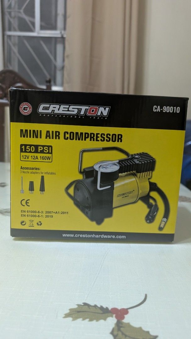 Mini Air compressor for car (Category: Other Automotive Parts and Accessories) located in Manila. Submitted by macalindong.bon23 (Listing ID 1469680413, Image 1). Description: For sale tire inflator for car. Bought from ace hardware. Used only once. - Model: Creston CA-90010 Mini Air Compressor - Power: 12V, 160W (150 PSI max) - Includes 3 nozzle adapters for various inflatables - Original packaging intact - Compact size, perfect for emergency ca