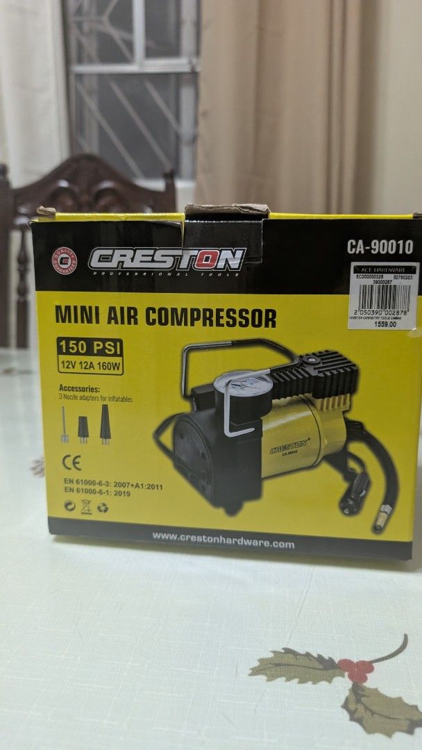 Mini Air compressor for car (Category: Other Automotive Parts and Accessories) located in Manila. Submitted by macalindong.bon23 (Listing ID 1469680413, Image 2). Description: For sale tire inflator for car. Bought from ace hardware. Used only once. - Model: Creston CA-90010 Mini Air Compressor - Power: 12V, 160W (150 PSI max) - Includes 3 nozzle adapters for various inflatables - Original packaging intact - Compact size, perfect for emergency ca
