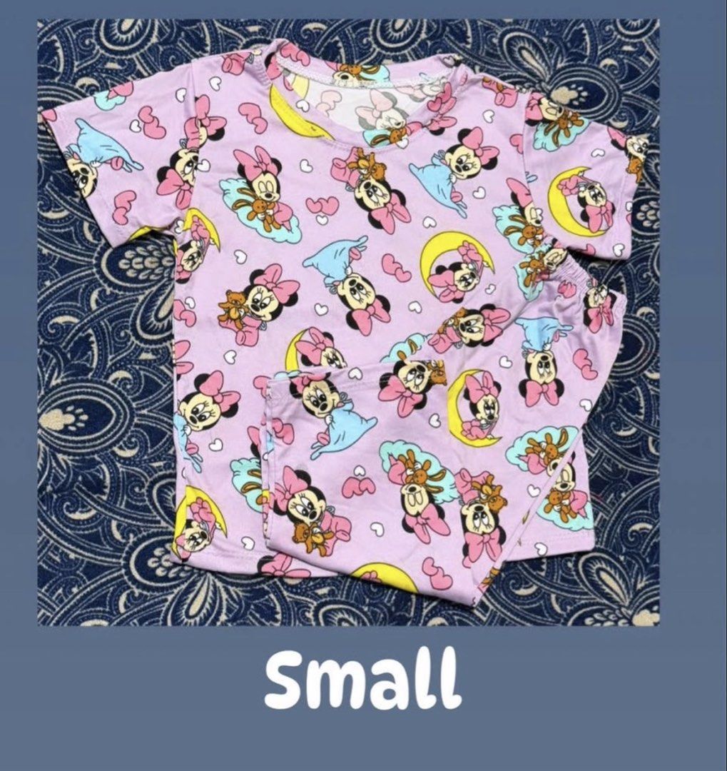 Minnie Mouse Short Sleeve Pyjamas Set Purple Small (Category: Shirts) located in Pasig City. Submitted by revieconde (Listing ID 1469754280, Image 1). Description: - Purple Minnie Mouse print pyjamas set - Includes short sleeve top and matching bottoms - Lightweight and comfortable fabric - Size: Small - Clean and ready to wear.