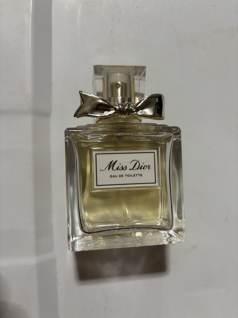 Miss Dior Eau de Toilette (Category: Fragrance & Deodorants) located in Manila. Submitted by ambrocioc91976 (Listing ID 1469714812, Image 1). Description: -75Ml/100Ml bottle. - Authentic Miss Dior Eau de Toilette - Classic square glass bottle with visible liquid level - Features iconic metal bow below the spray nozzle - Comes with original clear cap - Timeless floral scent by Dior - Great addition to any vanity or fragrance collection.