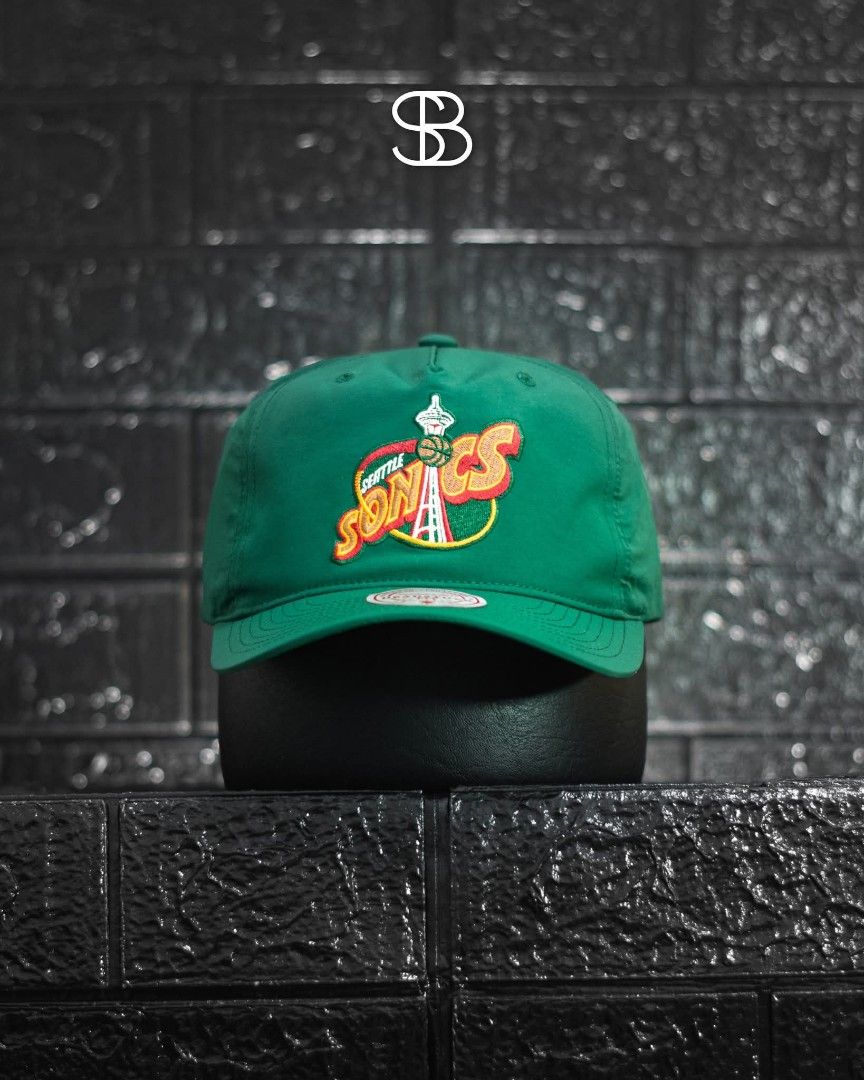 Mitchell & Ness Miami Dolphins Trucker Snapback Hat (Category: Caps & Hats) located in Manila. Submitted by dom032386 (Listing ID 1469585930, Image 2). Description: - Style: Trucker hat - Team: Miami Dolphins - Color: White and teal - Back: Classic breathable mesh - Closure: Adjustable snapback for easy sizing - Condition: Clean, ready to wear.