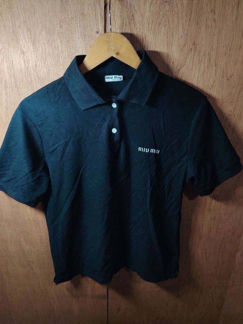 Miu Miu Black Polo Shirt (Category: Activewear) located in Baguio. Submitted by tabuzomaria1422 (Listing ID 1469699365, Image 1). Description: S-M Womens Size 10/10 color rate Excellent Condition.
