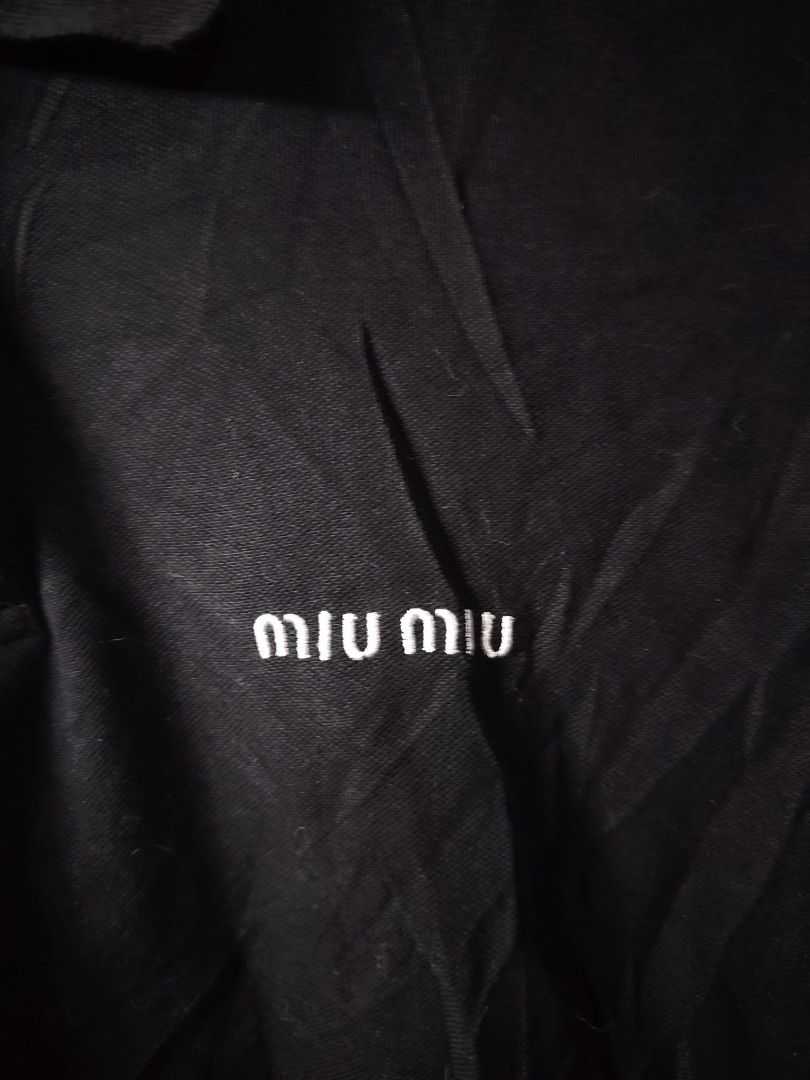 Miu Miu Black Polo Shirt (Category: Activewear) located in Baguio. Submitted by tabuzomaria1422 (Listing ID 1469699365, Image 2). Description: S-M Womens Size 10/10 color rate Excellent Condition.