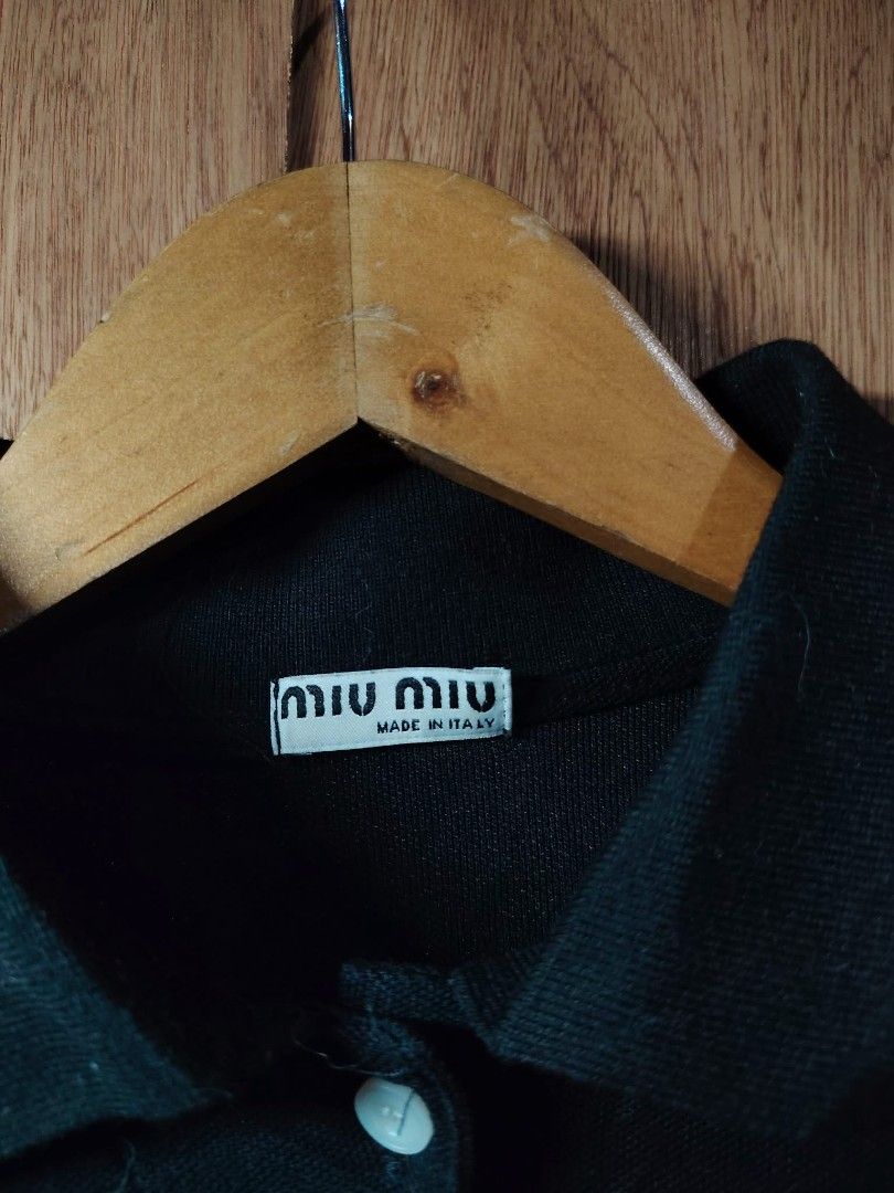 Miu Miu Black Polo Shirt (Category: Activewear) located in Baguio. Submitted by tabuzomaria1422 (Listing ID 1469699365, Image 3). Description: S-M Womens Size 10/10 color rate Excellent Condition.