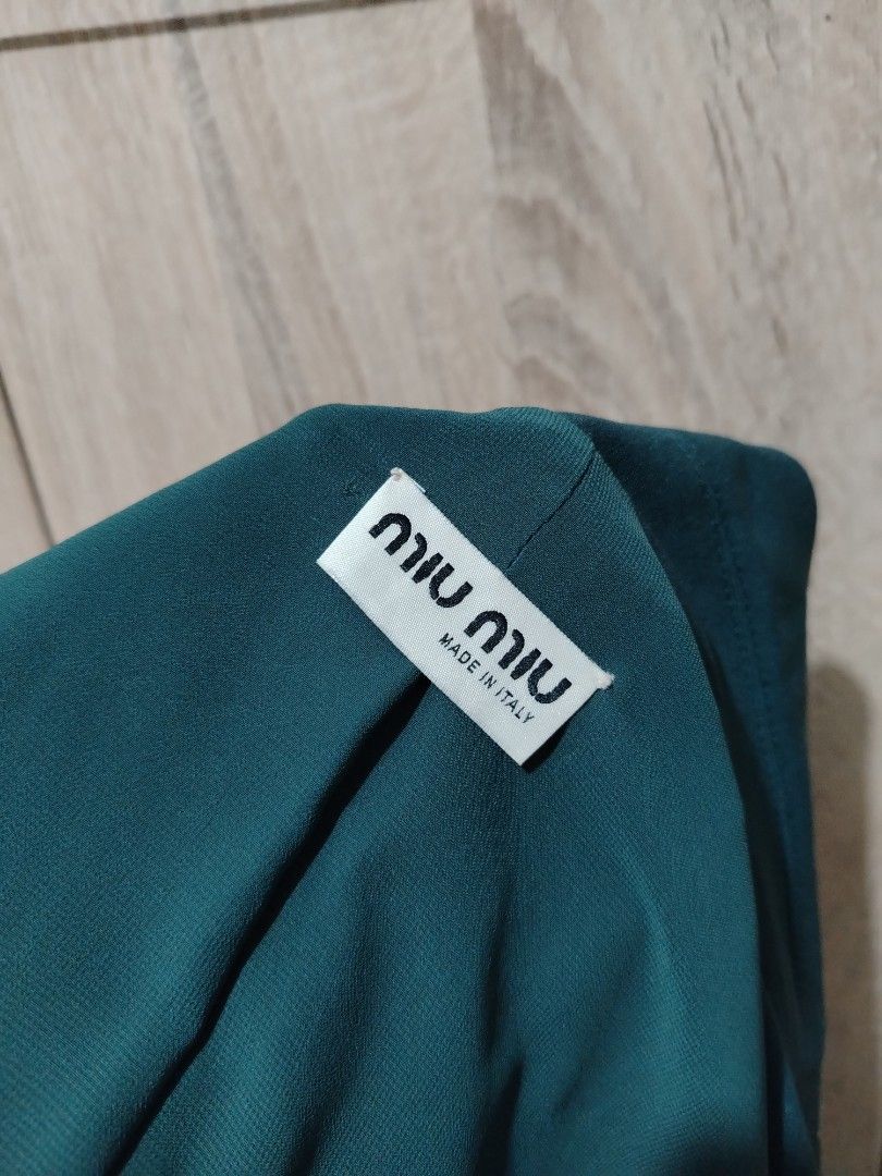 Miu Miu Green Double Breasted Blazer Coat (Category: Coats, Jackets and Outerwear) located in Plaridel. Submitted by orfdnix (Listing ID 1469659235, Image 3). Description: *MIU MIU Double breated blazer W: 18.5 L: 35 Sleeve: 22.5 Missing washtag Like new!! Loc: Bulacan .
