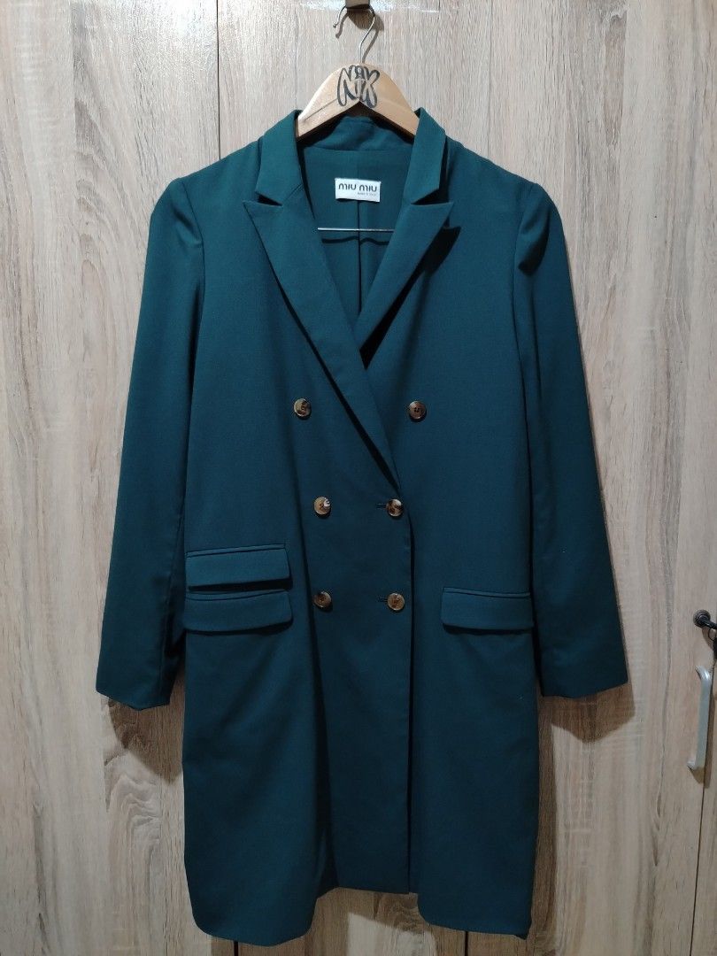 Miu Miu Green Double Breasted Blazer Coat (Category: Coats, Jackets and Outerwear) located in Plaridel. Submitted by orfdnix (Listing ID 1469659235, Image 1). Description: *MIU MIU Double breated blazer W: 18.5 L: 35 Sleeve: 22.5 Missing washtag Like new!! Loc: Bulacan .