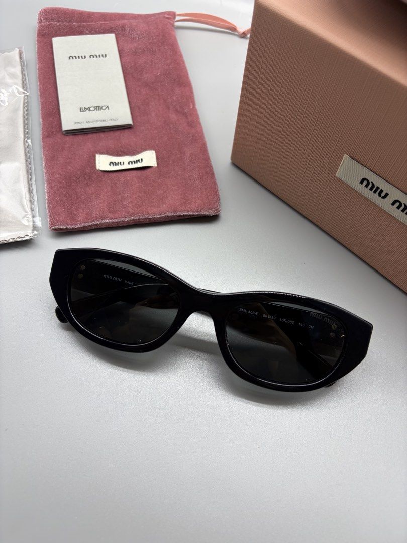 MiuMiu SMUA03S Sunglasses (Black) (Category: Sunglasses & Eyewear) located in Bacoor. Submitted by thegentleluxe (Listing ID 1469640349, Image 2). Description: MiuMiu SMUA03S Sunglasses (Black) Complete with Inclusions Paper Bag, Box, Soft Case, Cloth, Pouch, Booklet, Dummy Authenticity Card Pre-Order/On Hand 3795php only! (Shipping fee excluded) Follow our Page FB: Eye Dripz IG: eye_dripzph .