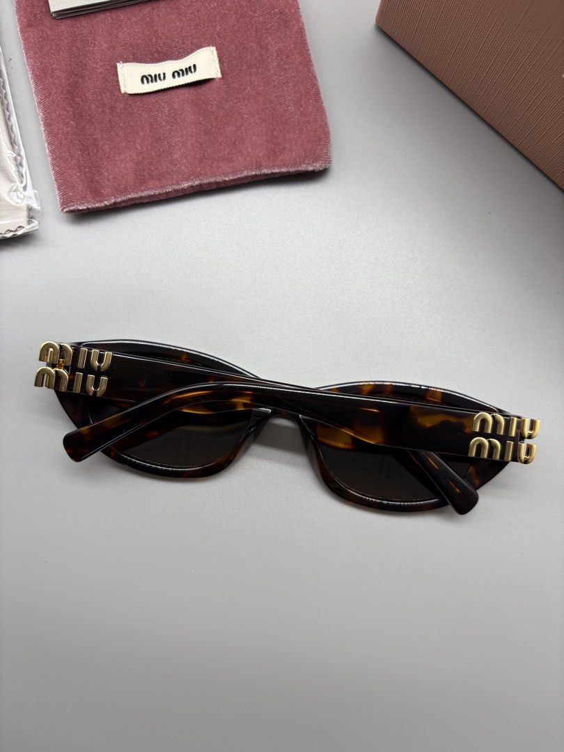 MiuMiu SMUA03S Sunglasses (Tortoiseshell) (Category: Sunglasses & Eyewear) located in Bacoor. Submitted by thegentleluxe (Listing ID 1469639767, Image 3). Description: MiuMiu SMUA03S Sunglasses (Tortoiseshell) Complete with Inclusions Paper Bag, Box, Soft Case, Cloth, Pouch, Booklet, Dummy Authenticity Card Pre-Order/On Hand 3795php only! (Shipping fee excluded) Follow our Page FB: Eye Dripz IG: eye_dripzph .