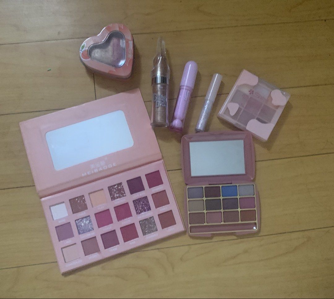 Mixed Makeups (Category: Makeup) located in Manila. Submitted by yurishinin (Listing ID 1469640673, Image 1). Description: Rfs: Decluttering, need space, badly need funds. Get niyo naaa - Makeup bundle for only 200! Inclusions: - 2 unbranded eyeshadow palette - Shawill eyeshadow palette and Shawill highlighter - Ashley Shine lip tint - Cloud Beauty Glitzy Dust (Badass) - Peripera Sugar Twinkle glitter Condition: Eyeshadow palettes and highlighter