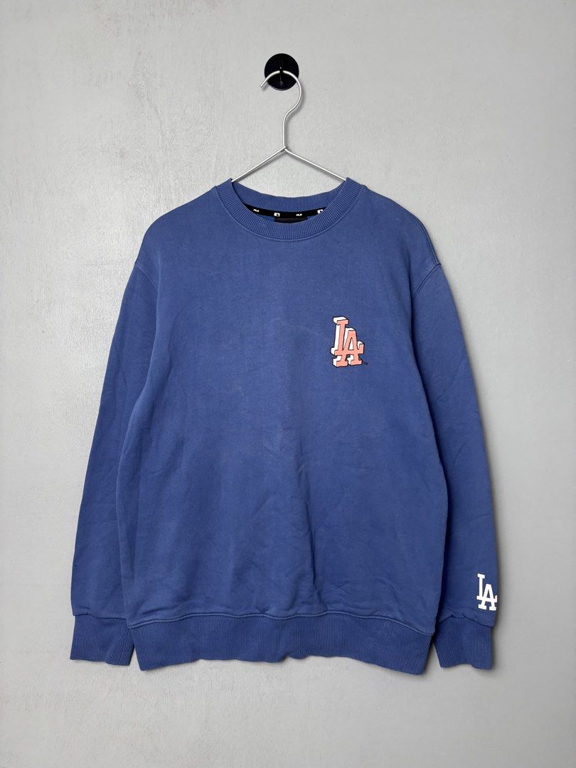 MLB "LA Dodgers" Crewneck Sweater (Category: Tshirts & Polo Shirts ) located in Mandaluyong City. Submitted by fellas_ph (Listing ID 1469673676, Image 1). Description: Excellent condition No issues Size M 21" Width 26.5" Length.