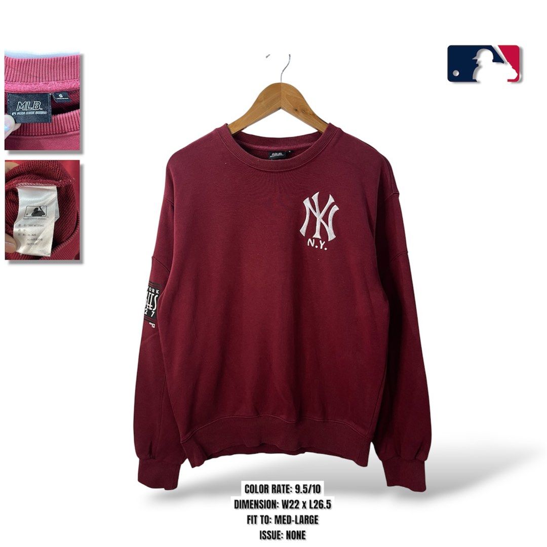 MLB New York Yankees Maroon Sweatshirt (Category: Coats, Jackets and Outerwear) located in Cabagan. Submitted by blessingma81004 (Listing ID 1469740284, Image 1). Description: - Item: Maroon MLB New York Yankees Sweatshirt - Design: Embroidered NY logo on chest, bold Yankees 1927 sleeve graphic, and vertical Yankees text embroidered on back collar - Size: Tagged S, fits M to L nicely - Measurements: Width 22 inches x Length 26.5 inches.