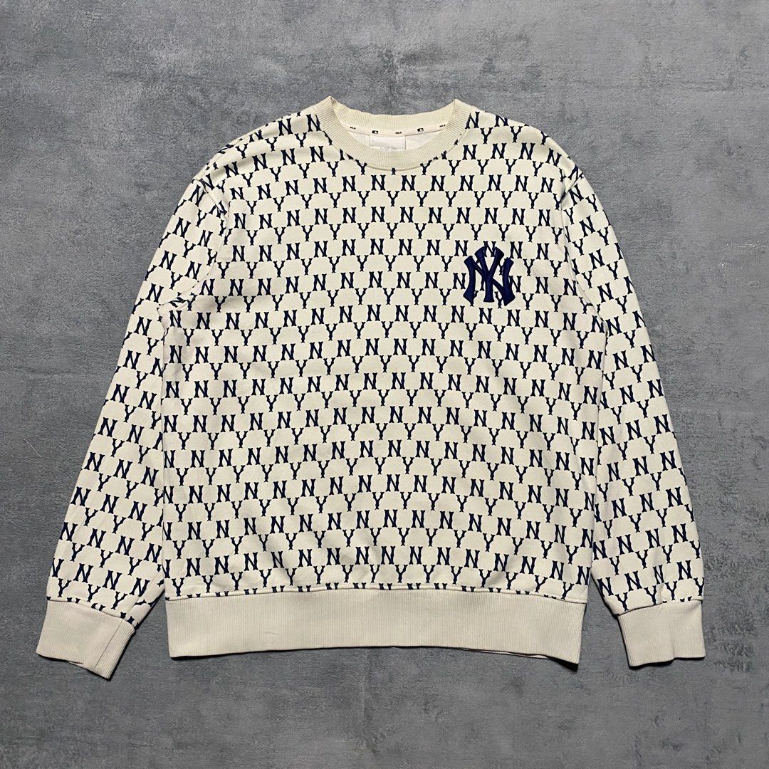MLB NY AOP Monogram Sweater (Category: Hoodies) located in Cavite. Submitted by kali_galleria (Listing ID 1469691397, Image 2). Description: Available 🏷️ MLB NY AOP Monogram 💎 (Beige & Navy blue) • Excellent Condition: 9.8 • Color rate: 9.8 • Width: 22-23 • Length: 27 • Best Fit: L-XL • Issue: 🏷️700 + SF “Thrift with your fingertip👆🏼”.