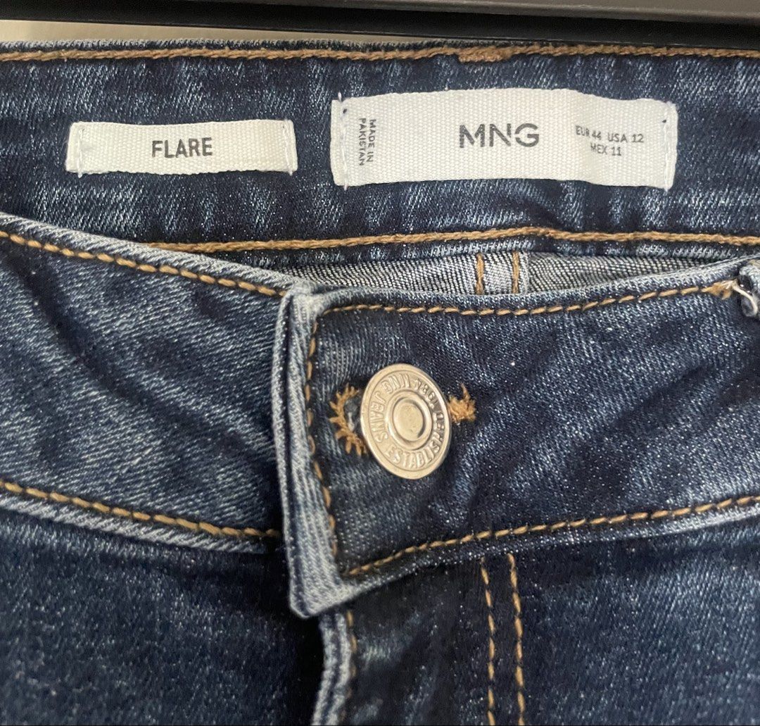 MNG Flare Jeans Dark Blue (Category: Jeans) located in Mandaue City. Submitted by piacatrina08 (Listing ID 1469621865, Image 3). Description: - Size: EUR 44 / USA 12 / MEX 11 - Measurements (laid flat): 34" waist, 43" length - stretchable.