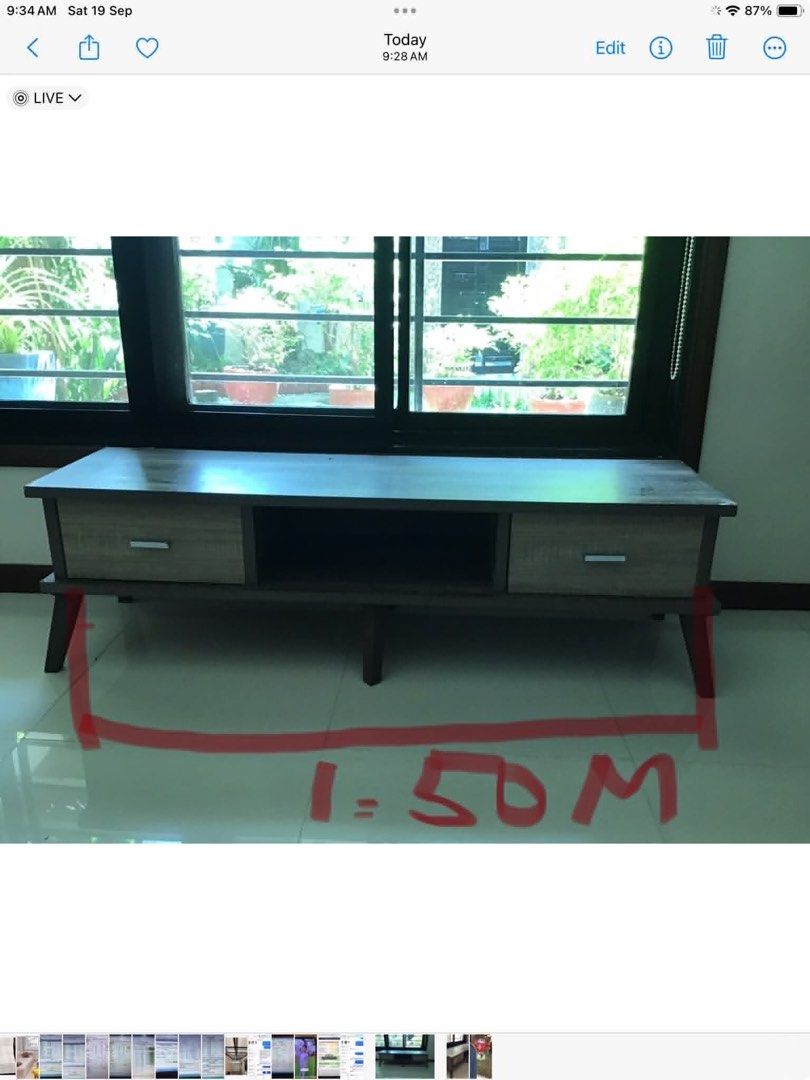 Modern Wood TV Console Media Unit 1.5m (Category: TV Consoles) located in Las Pinas. Submitted by shop.eo.home (Listing ID 1469608012, Image 3). Description: - Type: Wooden TV console - Dimensions: ~1.5m (L) x 40cm (W) x 45cm (H) - Storage: 2 sliding drawers with lighter wood grain fronts and silver handles, plus an open middle shelf - Design: Rustic brown finish supported by sturdy angled legs - Condition: Good, ideal for most living rooms and e