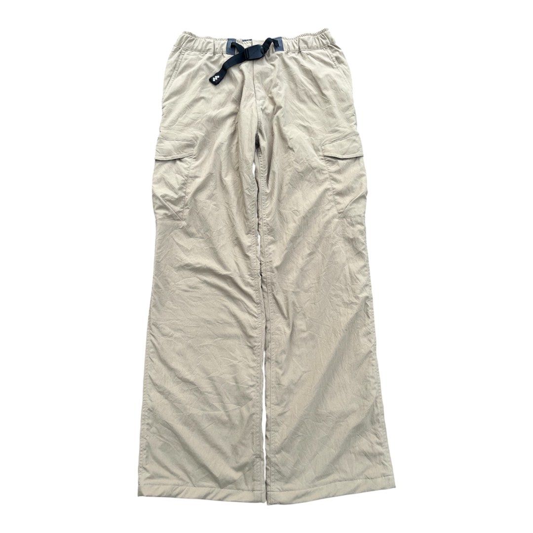 Mont-bell trekkingcargo pants beige (Category: Trousers) located in Bacoor. Submitted by 4103archivalgarmentph (Listing ID 1469652681, Image 1). Description: - Brand: Mont-bell - Color: Beige with cozy grey fleece lining - Size: US Medium / Japan Large - Features: Integrated waist belt and comfortable elastic waistband - Pockets: Secure zippered side pockets - Details: Embroidered brand logo - Condition: Excellent / Great for cold weather -28-36w
