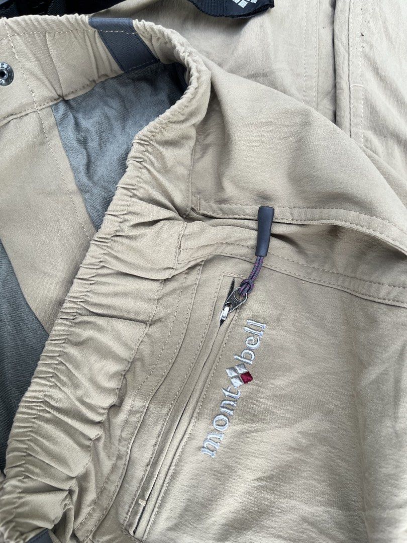 Mont-bell trekkingcargo pants beige (Category: Trousers) located in Bacoor. Submitted by 4103archivalgarmentph (Listing ID 1469652681, Image 3). Description: - Brand: Mont-bell - Color: Beige with cozy grey fleece lining - Size: US Medium / Japan Large - Features: Integrated waist belt and comfortable elastic waistband - Pockets: Secure zippered side pockets - Details: Embroidered brand logo - Condition: Excellent / Great for cold weather -28-36w