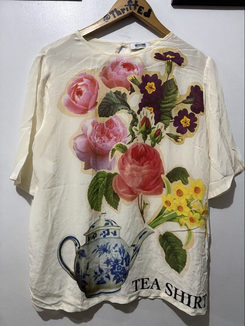 Moschino Cheap and chic “Tea Shirt” (Category: Luxury Apparel) located in Makati City. Submitted by ThriftedGoods (Listing ID 1469687667, Image 2). Description: Feel free to ask for more detailed photos In excellent condition No issues Length-28 Width-21.