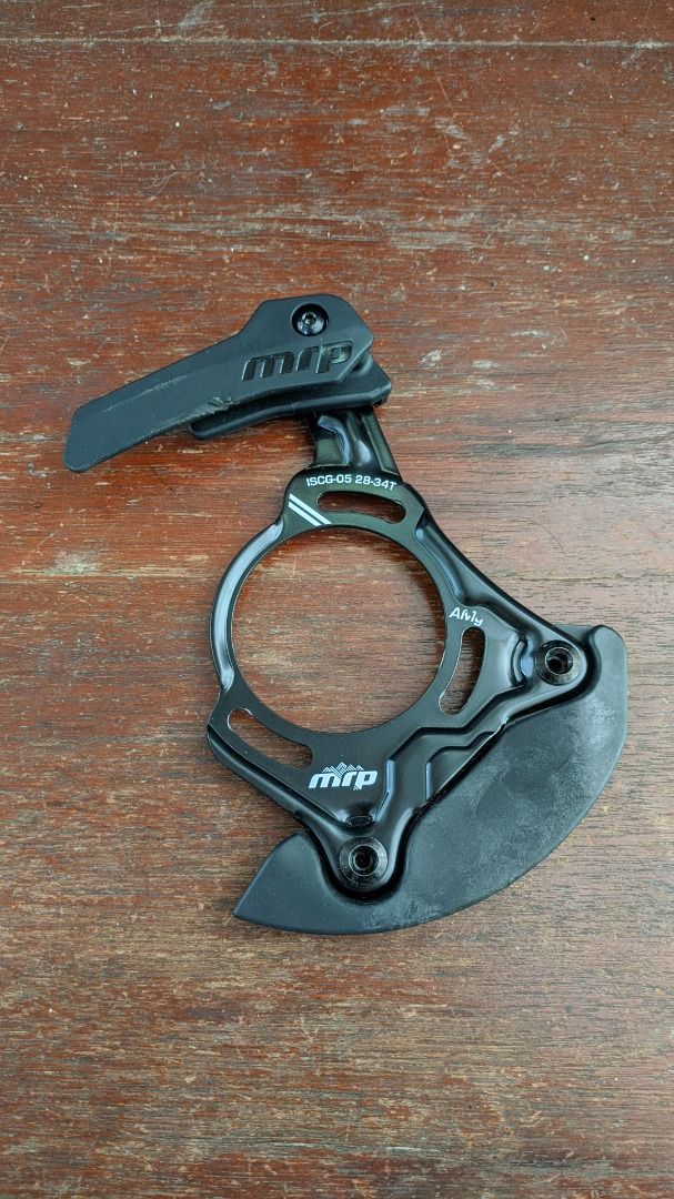 MRP AMg Chain Guide / Bashguard ISCG 05 28-34T (Category: Bicycles) located in Manila. Submitted by rvnebon_ (Listing ID 1469592420, Image 1). Description: 📍 Limay, Bataan • Chain guide with bashguard and upper guide • Mount Standard: ISCG-05 • Chainring Compatibility: 28T to 34T • Minor scuffs on the upper guide. Bashguard has no dings and still looks like new • RFS: Decluttering.
