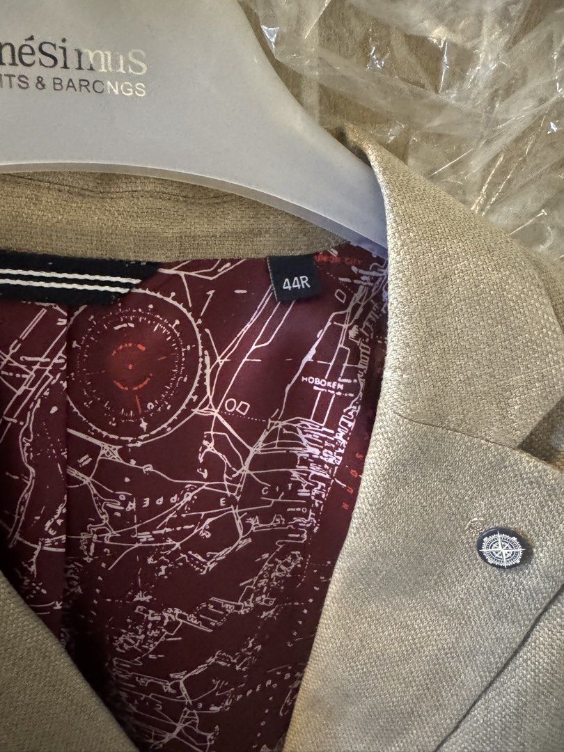 Nautica Beige Blazer Size 44R (Category: Coats, Jackets and Outerwear) located in Taguig. Submitted by dependingonvibe (Listing ID 1469620235, Image 2). Description: - Brand: Nautica - Color: Beige - Size: 44R (fits XL. American size) - Lining: Unique dark red map pattern - Features: Interior pockets and lapel pin - Condition: Clean and ready to wear - Versatility: Perfect for formal events or smart-casual outings Bought in USA. .