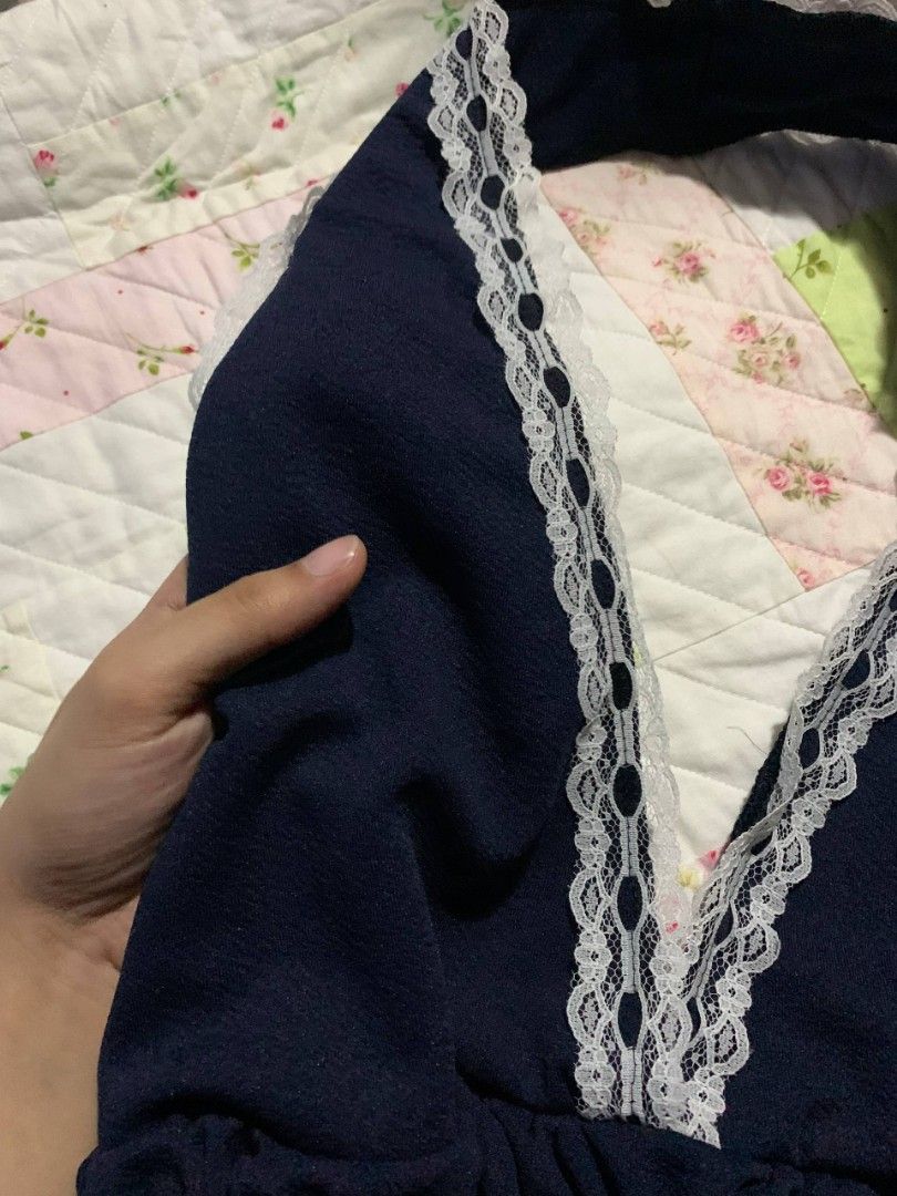 Navy Blue Lace Halter Top (Category: Sleeveless) located in Paranaque City. Submitted by dayiiee (Listing ID 1469674230, Image 3). Description: Navy blue halter top with delicate white lace detailing, a flattering smocked waist, and a cute peplum hem. Feminine, classy, and perfect for a girly outfit..