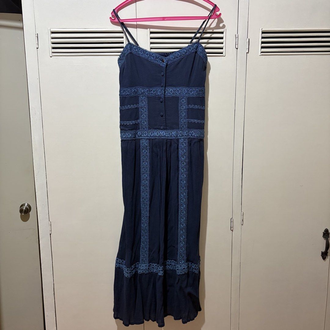 Navy Maxi Dress with Appliqué (Category: Dresses) located in Quezon City. Submitted by tflquezoncity (Listing ID 1469739513, Image 1). Description: ❤️ Rojita Japan ❤️ S-M ❤️ Pretty navy maxi dress with intricate appliqué detailing ❤️ Comfortable fabric with an inner polyester lining ❤️ Adjustable shoulder straps and front button-down closure ❤️ Well-maintained and ready to wear for casual outings or sunny days.