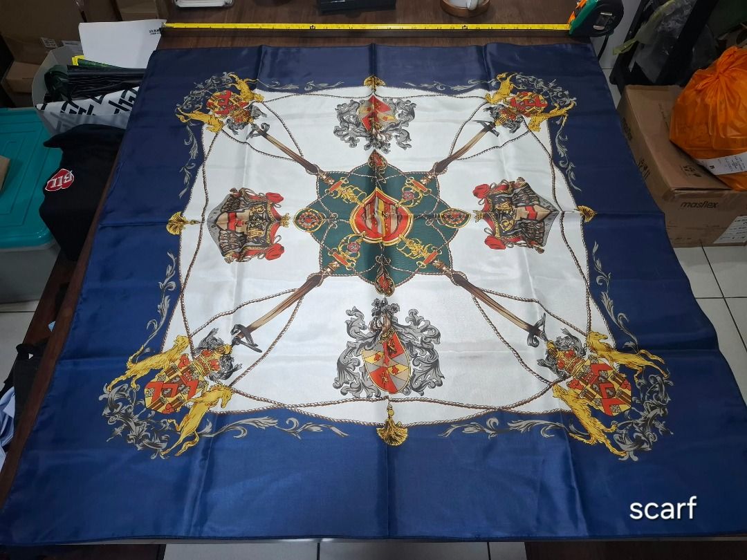 Navy White and Gold Print Scarf (Category: Scarves) located in Pasig City. Submitted by dripcounty (Listing ID 1469686581, Image 1). Description: Navy White and Gold Print Scarf ₱150 Bought in the Philippines Size: Free size Condition: Good / preloved Navy, white and gold scarf with decorative heraldic-style print. Brand unconfirmed. Actual item shown in photos. Delivery fee shouldered by buyer (Lalamove / other courier). Item price excludes deli