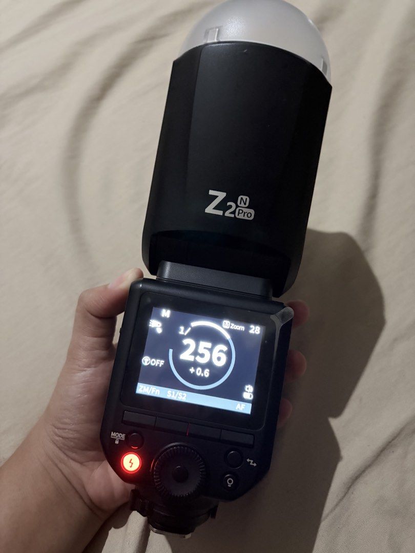 Neewer Z2 Pro Round Head Flash Speedlite Nikon (Category: Flashes) located in Quezon City. Submitted by angelajuliet__ (Listing ID 1469661432, Image 1). Description: - Brand/Model: Neewer Z2 Pro Round Head Flash Speedlite for Nikon - Condition: Fully functional, powers on cleanly with a bright, clear display - Power & Performance: 76Ws output power and 1/8000s High-Speed Sync (HSS) - Battery: Long-lasting 3000mAh rechargeable battery - Interface: