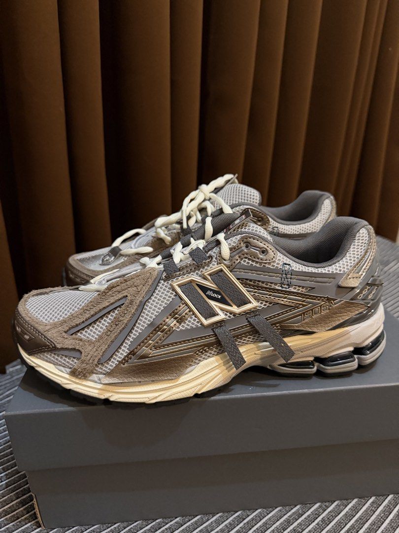 New Balance 1906A Grey Bronze (Category: Casual Shoes) located in Mandaluyong City. Submitted by marcomaligaya_ (Listing ID 1469587064, Image 1). Description: - Model: New Balance 1906A (Grey/Bronze) - Size: US 10 / UK 9.5 / EU 44 - Condition: Brand new, never worn, pristine out-of-box condition - Design: Chunky retro runner with distressed suede overlays, mesh base, and cream laces - Inclusions: Complete with original dark grey box.