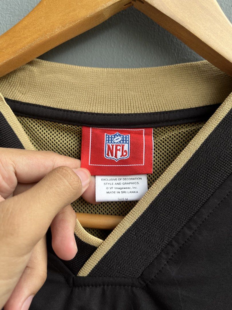 New Orleans Saints NFL V-neck Pullover Windbreaker Jacket (Category: Coats, Jackets and Outerwear) located in Balamban. Submitted by just_findss (Listing ID 1469678471, Image 3). Description: New Orleans Saints NFL V-neck Pullover Windbreaker Jacket Excellent Condition Size M on tag Dimes 24W / 28L Color Rate 9.8/10.