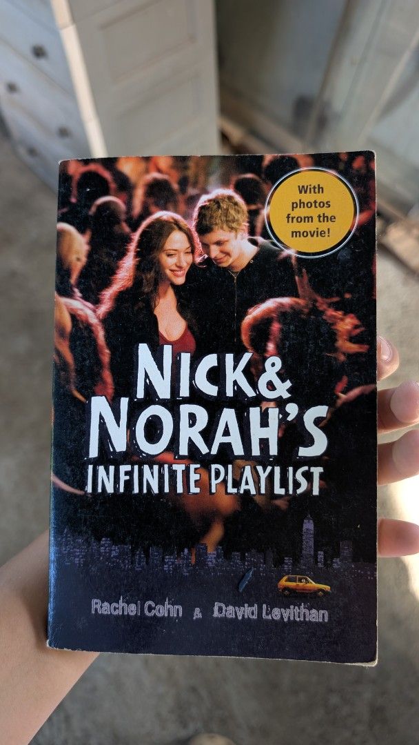 Nick & Norah's Infinite Playlist Paperback Novel (Category: Storybooks) located in Manila. Submitted by alypacis06 (Listing ID 1469659719, Image 1). Description: - Title: Nick and Norah's Infinite Playlist by Rachel Cohn and David Levithan - Edition: Movie tie-in paperback featuring Michael Cera and Kat Dennings on the cover - Special Features: Includes photos inside from the movie - Condition: Clean pages with minor shelf wear on edges and corne