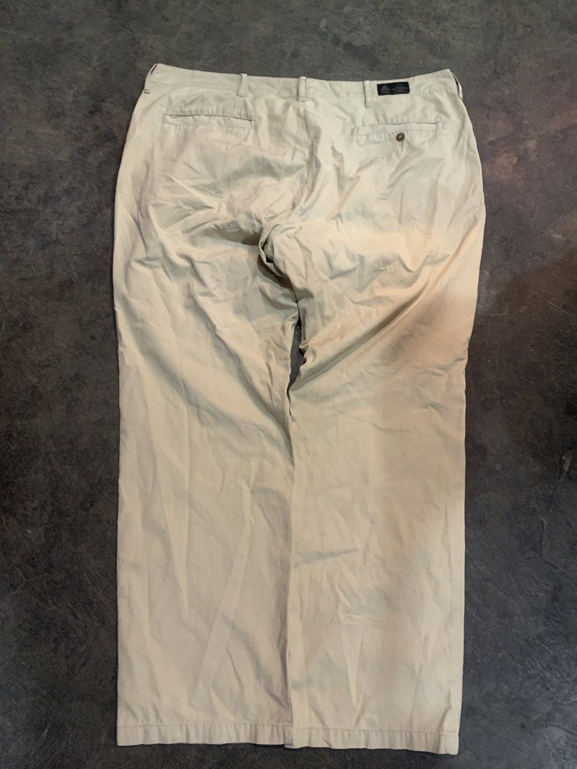Nike ACG Beige Ripstop Cargo Pants Size 36 (Category: Joggers) located in Cagayan de Oro. Submitted by agboysalis60090 (Listing ID 1469709756, Image 2). Description: Nike ACG khaki beige pants in size 36. Button fly closure with multiple buttons down the front. Ripstop fabric texture. Classic ACG logo tag on the inside waistband and back exterior. Relaxed straight leg fit. Great vintage outdoor gear piece..