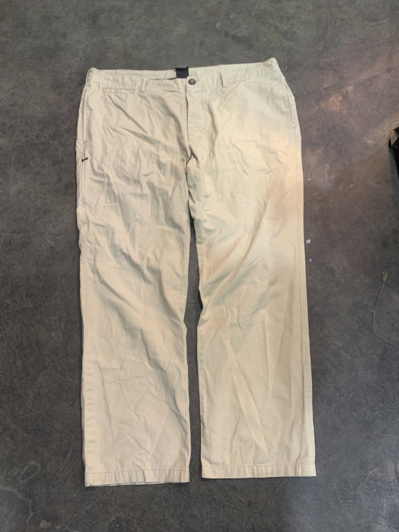 Nike ACG Beige Ripstop Cargo Pants Size 36 (Category: Joggers) located in Cagayan de Oro. Submitted by agboysalis60090 (Listing ID 1469709756, Image 1). Description: Nike ACG khaki beige pants in size 36. Button fly closure with multiple buttons down the front. Ripstop fabric texture. Classic ACG logo tag on the inside waistband and back exterior. Relaxed straight leg fit. Great vintage outdoor gear piece..