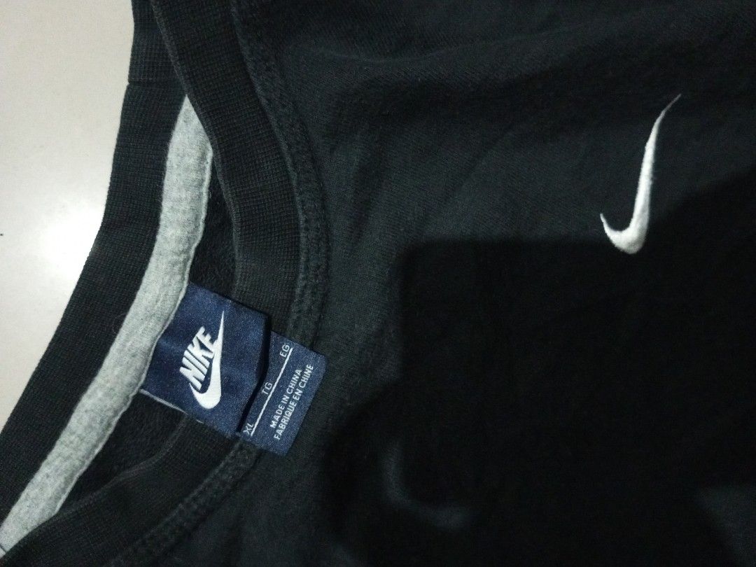Nike Black Crewneck Sweatshirt XL (Category: Coats, Jackets and Outerwear) located in Bacolod City. Submitted by richjohn.958 (Listing ID 1469669148, Image 2). Description: - Brand: Nike - Style: Classic pullover crewneck sweatshirt - Color: Black with white embroidered swoosh logo - Size: Extra Large (XL) - Condition: Clean, excellent overall condition - Details: Neck and care tags fully intact - Perfect for everyday casual wear.